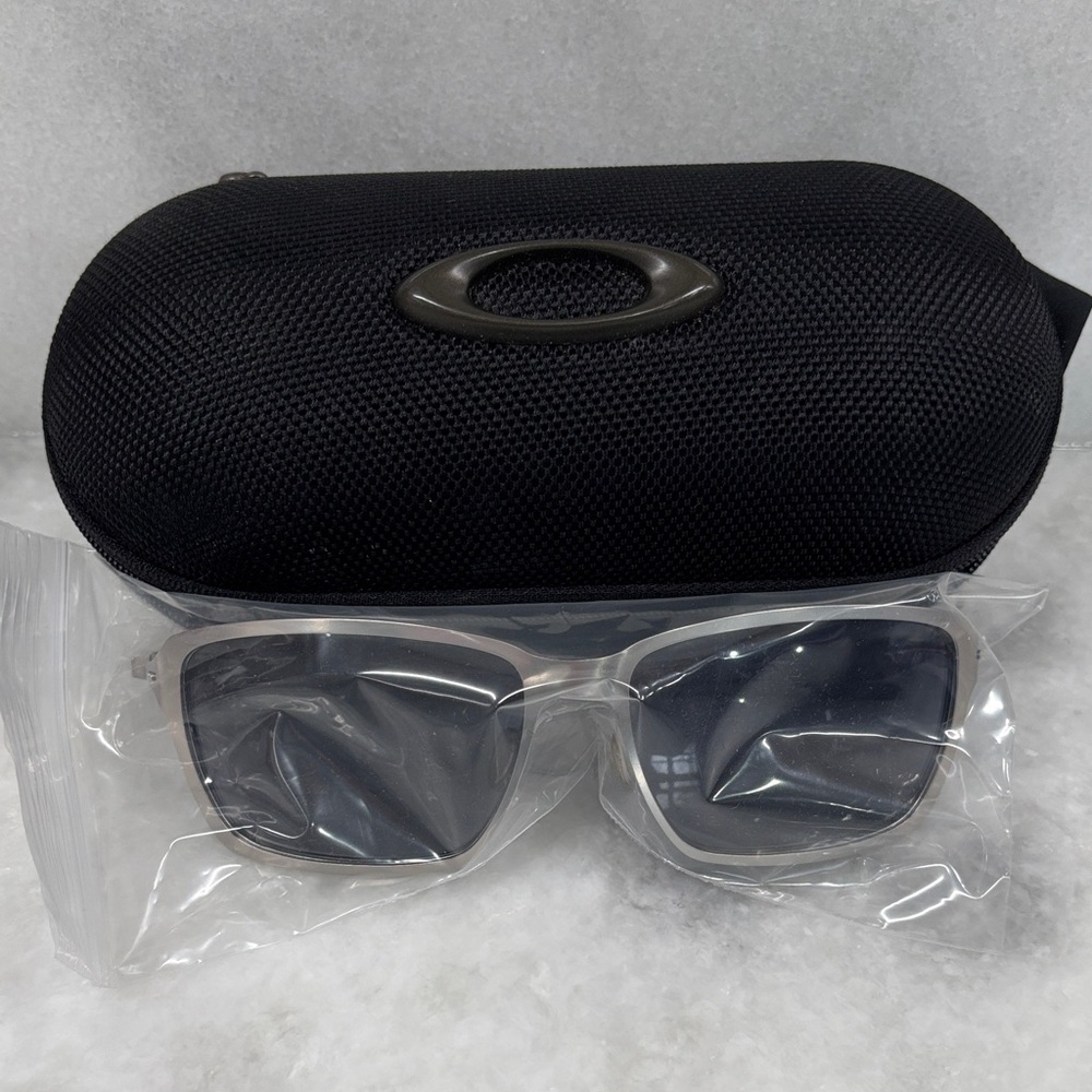 Oakley Gray Sunglasses with Black Case